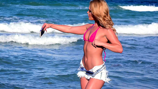 Stunning girl Abby Cross makes a video of her tanned body by the sea