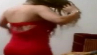 Arab girl with big ass and boobies covered with red dress dances