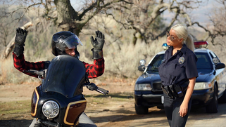 Blonde cop Bridgette B interrupts watching porn to catch impudent biker