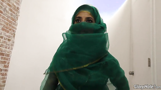 Arab lovely in green hijab finds gloryhole room in a sex shop | XXX Video on AllSex.XXX