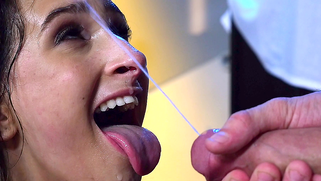 Dose of sperm pouring over sexy Ashley Adams's face as result of sex