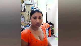 XXX chick wears low cut so Desi boobs are half-naked in sex show