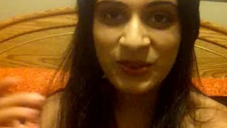 Playful young Paki girl tastes pussy juice in amateur XXX video