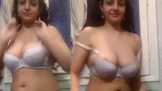 Desi webcam model poses wearing white bra and sexy black panties