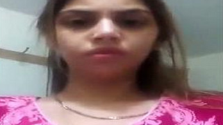 Charming Desi girl takes off sexy red bra in front of camera