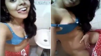 Desi webcam model with sexy body teases spectators showing tits