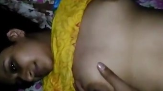 Guy touches Indian babe's boobs having oral sex in front of the camera