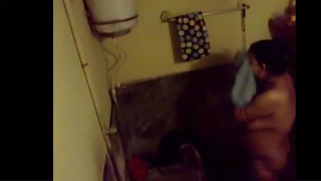 Indian takes a bath and changes clothes watched by XXX addicted stepson