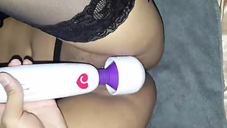 Guy tests big vibrator on handcuffed Desi girl in bra and stockings