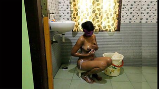 Indian girl agrees to take shower on camera only if she wears mask