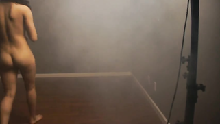 Nude Indian chick fools around during XXX photo shoot in strange room