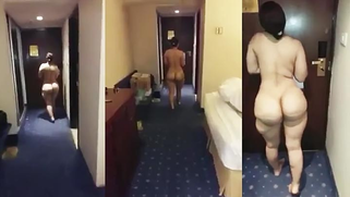 Shameless Desi XXX woman walks being naked in hotel hallway