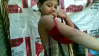 Indian teen isn't shy about putting on clothes in front of Desi XXX guy