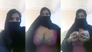 Pretty Desi beauty in hijab demonstrates massive XXX jugs on camera