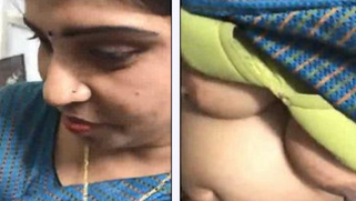 Indian female allows friend to film her XXX saggy boobies under sari