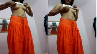 Teen Desi girl gets naked in front of camera trying to wear XXX skirt