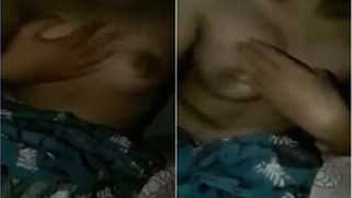 Indian woman squeezes XXX tits getting them out of her sari upon request