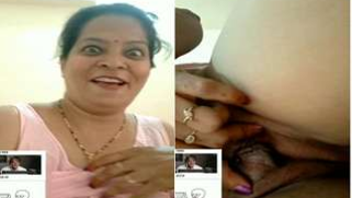 Busty Indian woman acts in XXX webcam show masturbating for online friend