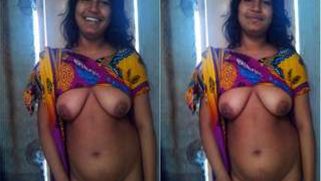 Cameraman watches Indian slut wearing bra hiding her XXX titties