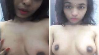 Beautiful Indian girl takes a green sari off flaunting XXX titties