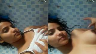 Lovely Indian debunks XXX boobs and greedily touches them in porn video