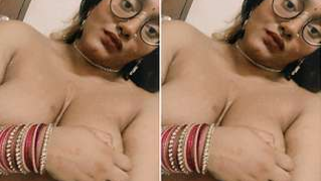 Young Desi woman skillfully plays with naked XXX tits for subscribers