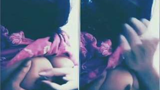 Indian female in a hijab doesn't show her face but XXX natural boobs