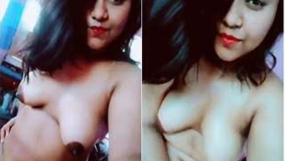 Desi girl with dark XXX nipples and playful eyes poses naked on webcam