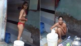 Desi chick takes an outdoor bath in the nude but BF films this XXX show