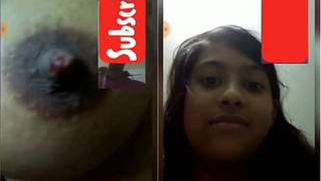 Young Indian woman shows off her XXX tits for online fan on phone camera