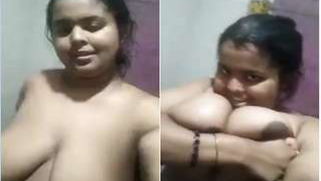 Alluring girl with Desi features puts her XXX breasts right in the camera