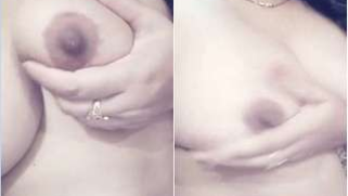 Female flashes her XXX boobs on camera and squeezes them in turn