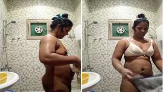 Titillating Indian housewife reveals her small XXX boobs for a bit