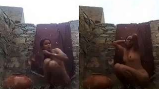 Offensive babe washes her XXX body outdoors being filmed by Desi man