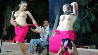 Smutty dancer in a pink dress broadcasts her XXX parts in a Desi show