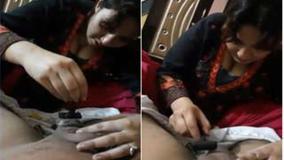 Caring Desi wife shaves husband's balls in a first-person XXX video