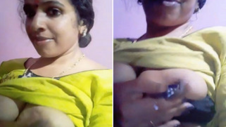 Attractive Indian teen gladly plays with her XXX boobs and nipples