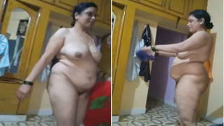 Cunning guy films fat Desi woman walking around room without XXX clothes
