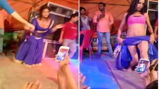 Two slim Desi teens seductively dance during XXX show under the tent