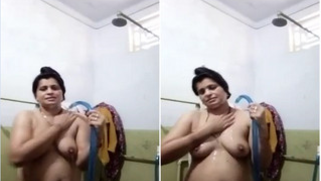 Attractive Indian BBW woman relaxes in the XXX shower fully naked