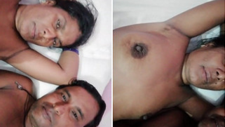 Amateur cameraman films naked wife and himself lying on the bed