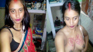 Indian girl with headphones in ears exposes XXX boobies with sex text on