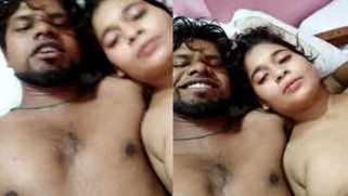 Desi slut lies in bed with her XXX boyfriend in the nude after sex