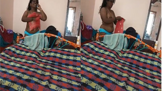 Desi XXX MILF talks on the phone with her sex body parts naked