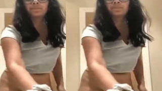 Young Indian woman flashes her hairy vagina and puts sex panties on