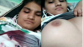 Busty Desi girl pulls T-shirt up exposing her XXX boobies and sex opening