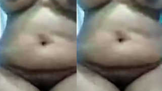 Desi with a big belly films her XXX boobs and fingers sex hole