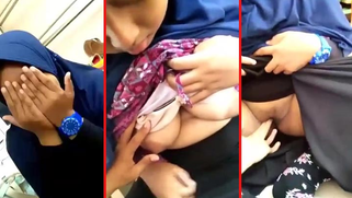 Malay babe with hijab on says hello to XXX partner's finger in her vagina