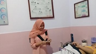 Melayu wife in hijab films XXX nurse giving an injection to her husband