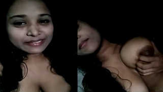 Young Indian woman exposes her natural XXX tits and hairy sex opening